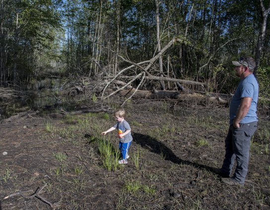 Land owners in dispute over flooded property