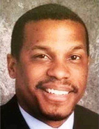 W Torian White headshot