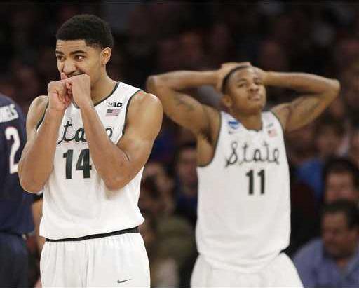 NCAA UConn Michigan S Heal