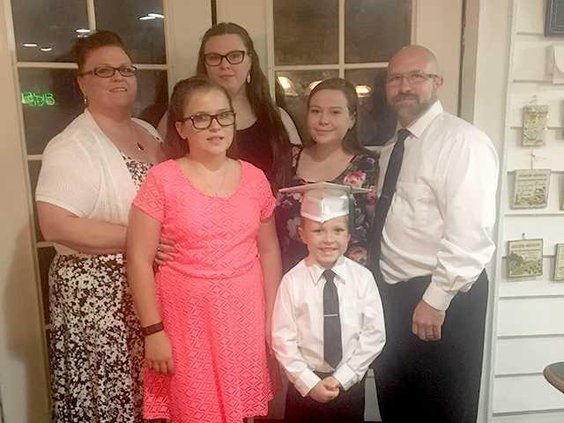 Amy and family pictured at son Noahs gradution from Richmond Hill Montessori. Photo provided