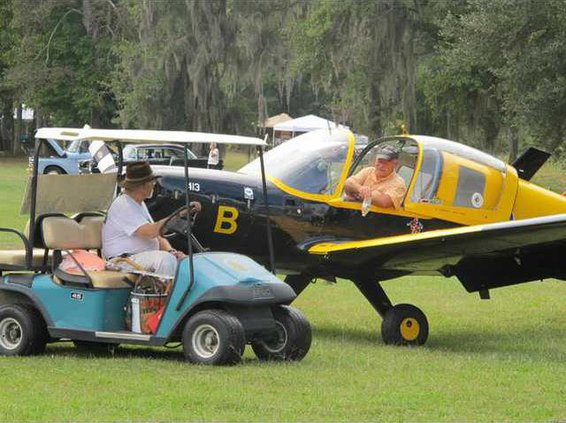 Berg greeting pilot after landing