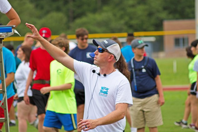 Director Alford reaches for notes corrected.jpg