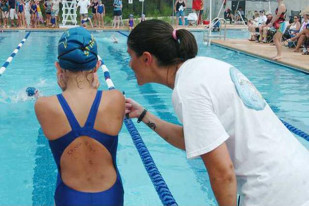 coach and swimmer