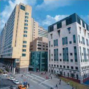 Grady-Exterior-with-Clinic-Building-e1399494138763