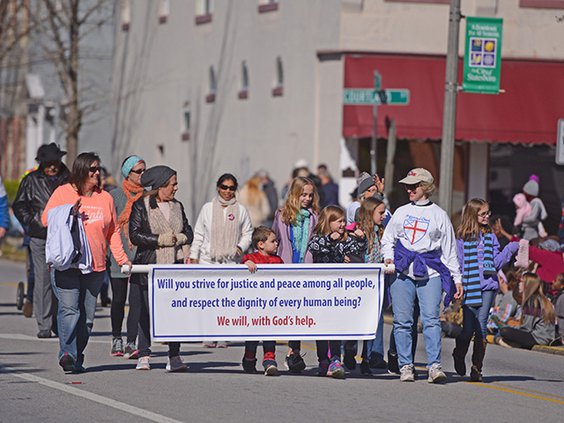 W marchers with sign.jpg