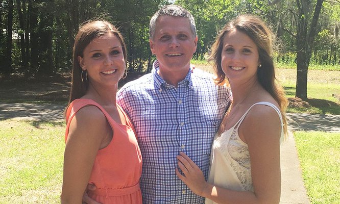 Courtesy of Abbie DeLoach Foundation Abbie DeLoach, right, enjoys a family moment with her sister Anna, left, and their father, Jimmy DeLoach Jr., sometime before Abbie’s untimely death in April 2015.