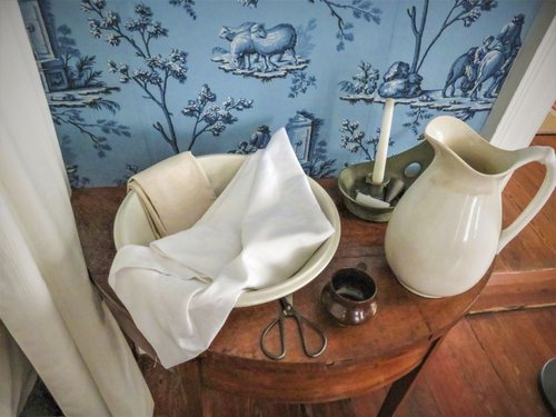 A bedroom has been converted to portray a birthing chamber