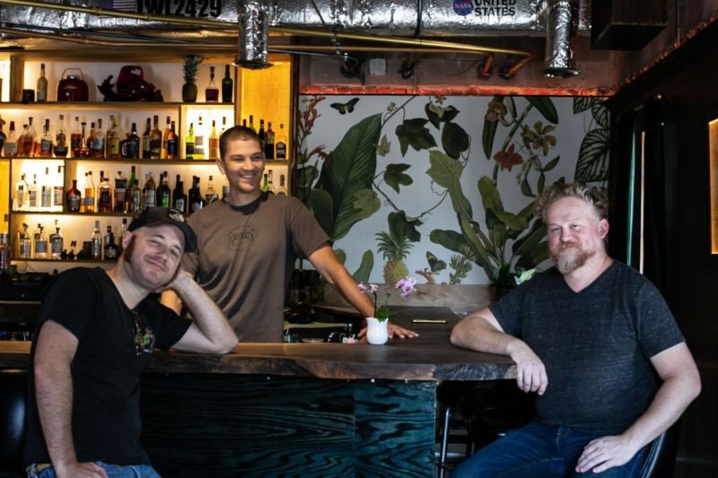 The Lone Wolfpack: Worley, Mack, and Ripley at the custom bar.