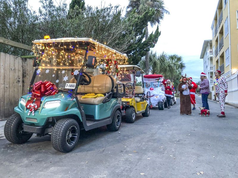 Tybee Island’s semi-sanctioned Christmas Caravan on Dec. 4 inspired locals to festoon their golf carts with strings of lights and other jolly decorations.