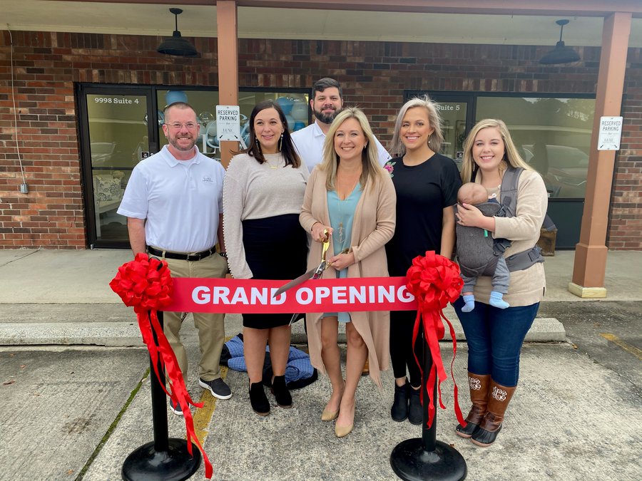 Business ribbon cutting Luxe Real Estate Bryan County News