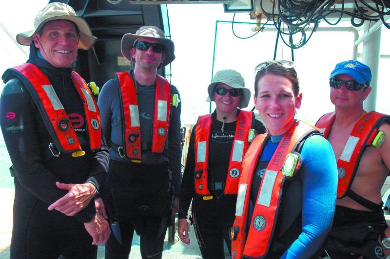 Georgia Southern’s Dr. Danny Gleason (l.) and other resident scientists ready for a dive
