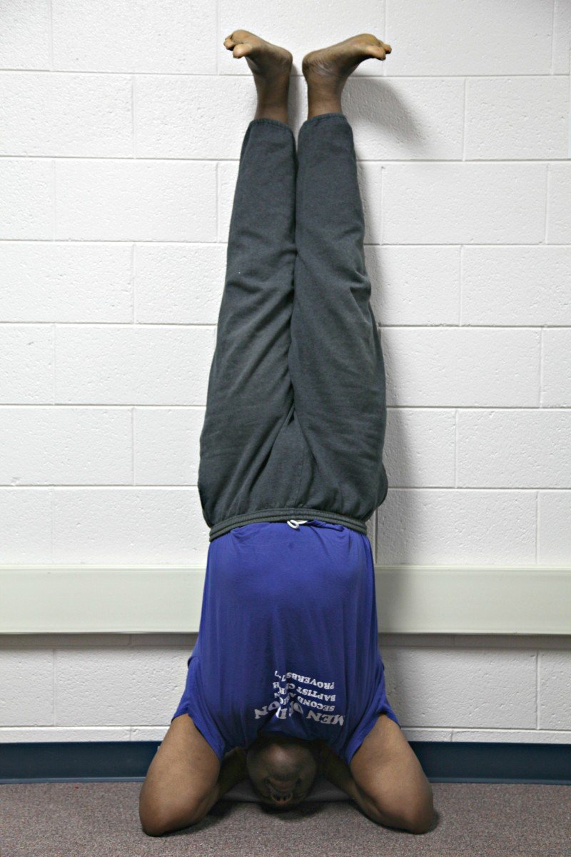Yoga headstands are not for everyone and should be performed with the guidance of a certified yoga instruction. For Reginald Franklin, the headstand and other yoga postures improve strength, confidence, and balance.