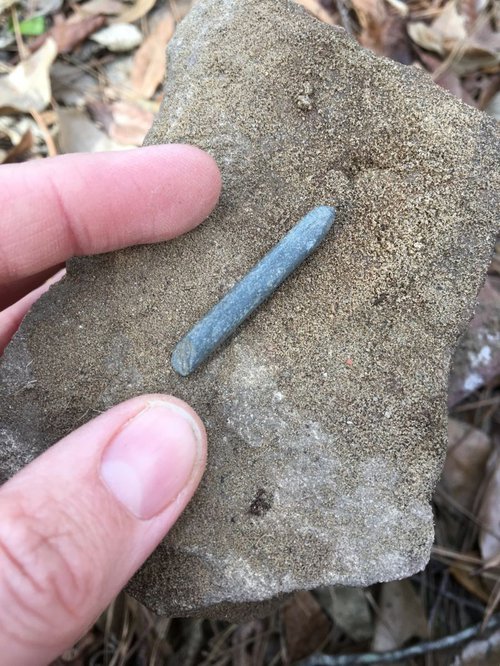 A slate pencil found near a Skidaway Island golf course shows that a school once stood there.