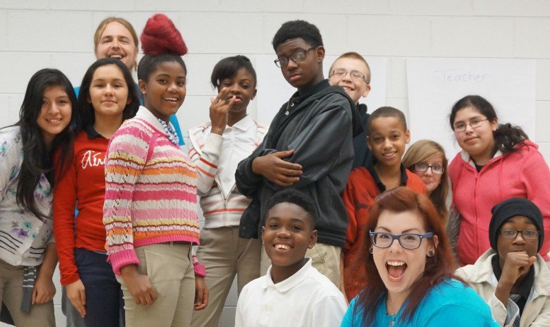 Group shot of the Deep Center workshop at Mercer Middle School, with André Massey at center.