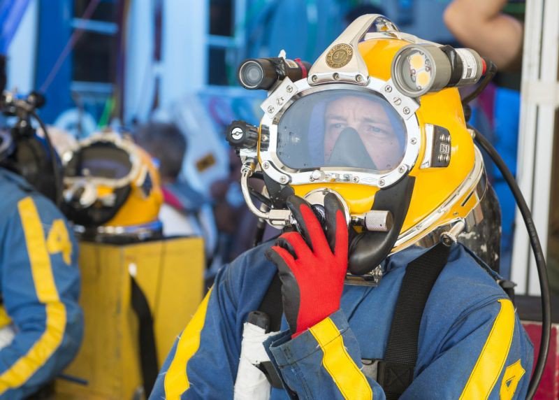A U.S. Navy diver prepares to descend to the wreck of the Georgia