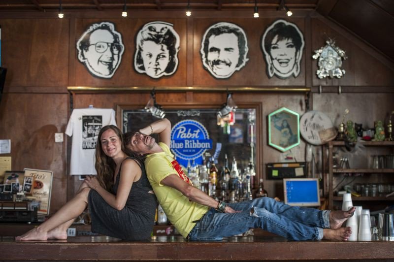 Heather & Wes on the famous bar at Hang Fire