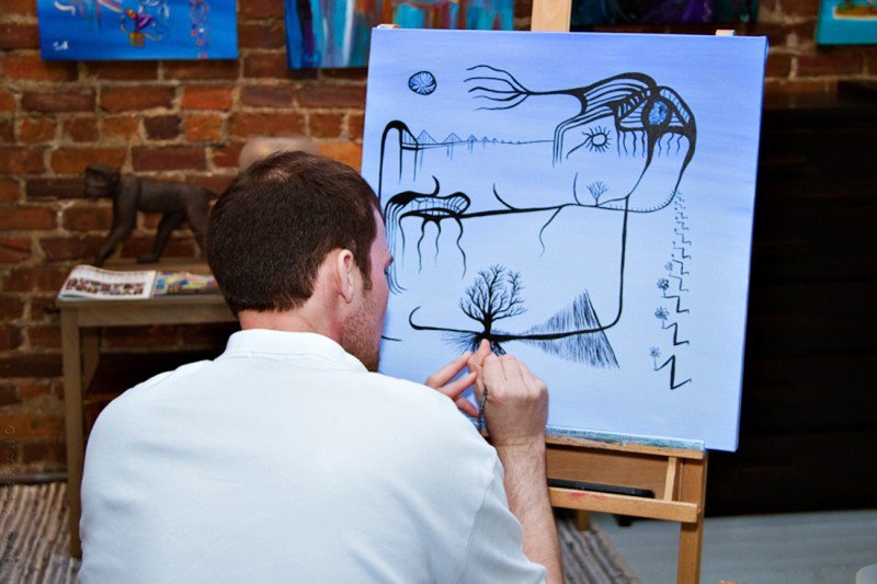 Jonathan G Keller in his City Market gallery and studio space during Savannah Art Walk.