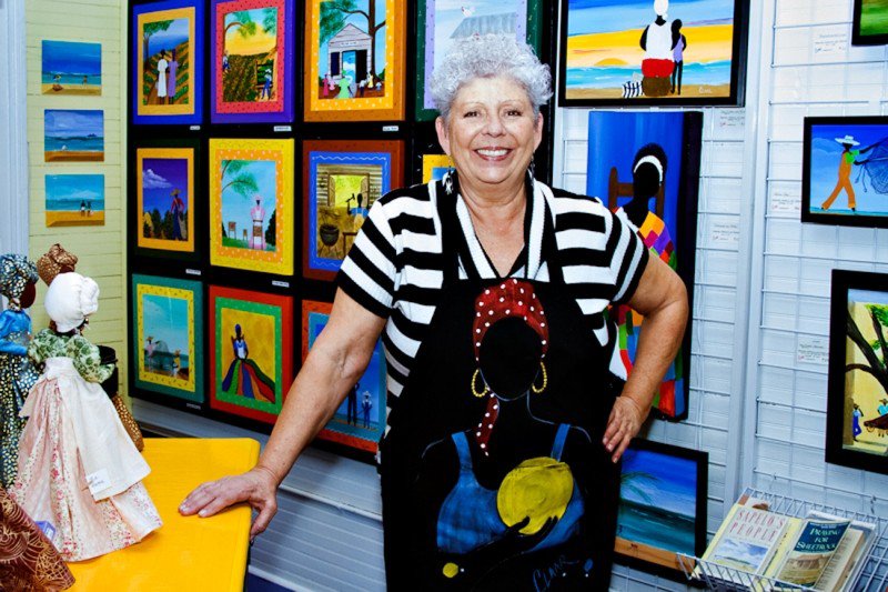 Local artist Samantha Claar in her City Market gallery space during Savannah Art Walk.