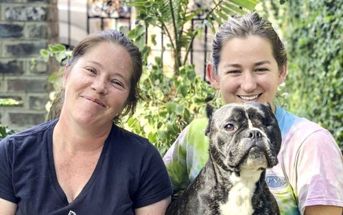 Jennifer Taylor and Shelby Westberry with one of their rescue pups.