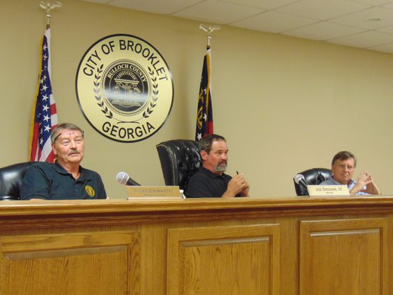 Brooklet Councilman Nicky Gwinnett, Mayor Joe Grooms III and City Attorney Hugh Hunter, left to right, take part in discussion during a June meeting where a concept was presented for a downtown Brooklet sewer system. Affected property owners have been inv