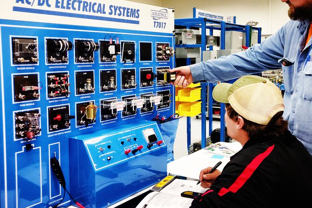 A student works at an training center for electrical systems. Ogeechee Technical College will launch its Manufacturing Engineering Technology program Aug. 23, hoping to help students begin, or advance careers, in manufacturing