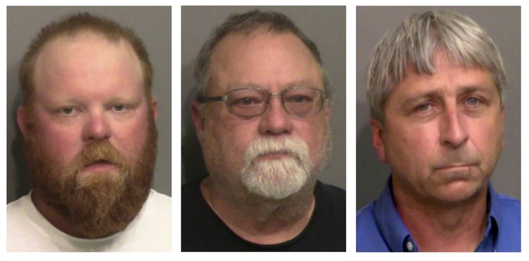 This combination of booking photos provided by the Glynn County, Ga., Detention Center, shows, from left, Travis McMichael, his father, Gregory McMichael, and William "Roddie" Bryan Jr. On Friday, Oct. 1, 2021, a Georgia judge has ruled that Ahmaud Arbery