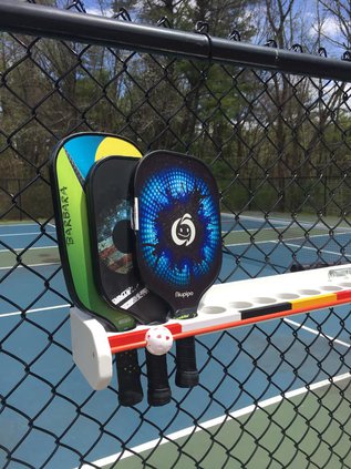balls and paddles pickleball
