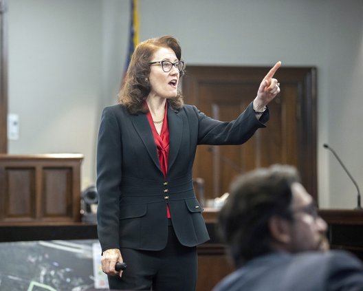 Prosecutor Linda Dunikoski presents a closing argument to the jury during the trial of Travis McMichael, his father, Gregory McMichael, and William "Roddie" Bryan, at the Glynn County Courthouse, Monday, Nov. 22, 2021, in Brunswick, Ga. The three men char