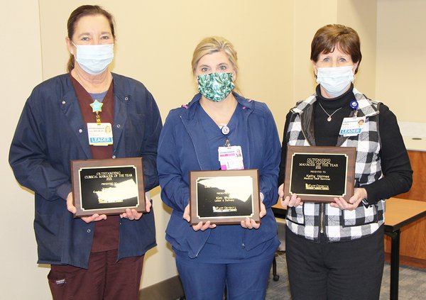 Joy Pope, left, Kim Wolfe, Center and Kathy Holmes all earned employee honors from East Georgia Regional Medical Center for 2021.