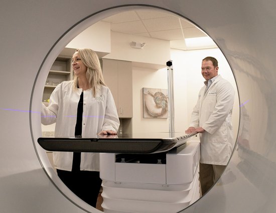 Dr. Aaron Pederson and radiation therapist Tonya Bishop are ready to go on the new Halcyon radiation oncology treatment machine at South Georgia Center for Cancer Care.