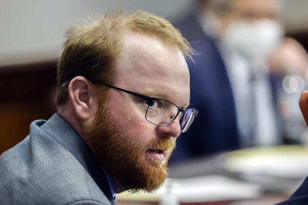 Travis McMichael looks on during the sentencing in his trial along with his father Greg McMichael and neighbor, William "Roddie" Bryan in the Glynn County Courthouse, on Jan. 7, 2022, in Brunswick, Ga. Travis McMichael, the man convicted of murder for sho