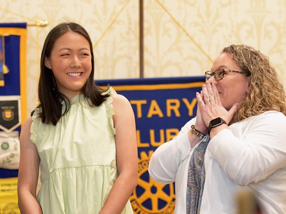 Statesboro High English teacher Jen Calhoun, right, reacts as senior Evy Shen is named the 2022 STAR student during a recognition ceremony at the Forest Heights Country Club on Feb. 9. Shen named Calhoun, who teaches English language arts and AP language,