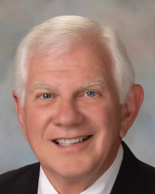 Michael L. “Mike” Rollins