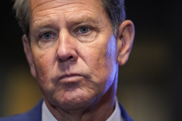 Georgia Gov. Brian Kemp speaks during a news conference at Lockheed Martin on Aug. 26, 2021, in Marietta, Ga. Citing increased revenues, Gov. Kemp on Wednesday, March 16, 2022 signed an amended budget that includes pay boosts for state employees, hundreds