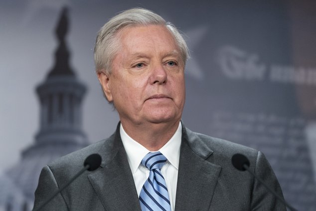 Sen. Lindsey Graham, R-S.C., speaks with reporters about aid to Ukraine, on Capitol Hill, Wednesday, March 10, 2022, in Washington. The Georgia prosecutor investigating the conduct of former President Donald Trump and his allies after the 2020 election is
