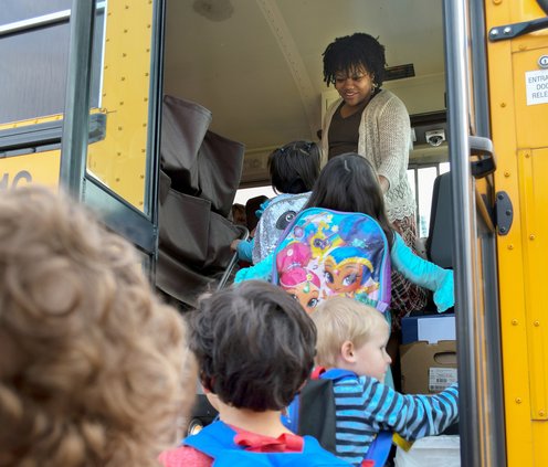 In this Herald file photo from 2019, Bulloch County Schools bus driver Faith Mobley welcomes Pre-K students aboard at Southeast Bulloch High School. Like many school systems around the nation, Bulloch County is facing a critical shortage of bus drivers.