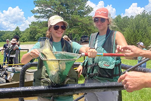 Photo Courtesy Georgia Department of Natural Resources Two attendees of the Georgia Department of Natural Resources Caree Academy work on a project. The DNR is accepting applications for the 2023 Career Academy.