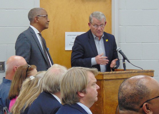 Bulloch County Manager Tom Couch, right, and Statesboro City Manager Charles Penny, left, take their turns presenting information on growth projections and infrastructure plans during Tuesday afternoon's joint meeting.