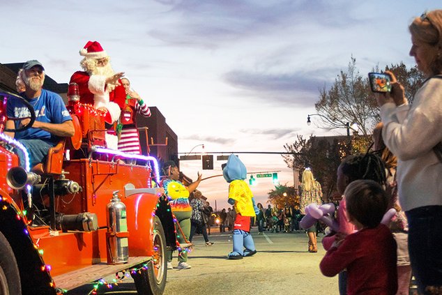 In this photo from the 2021 Christmas Celebration, Santa and Mrs. Claus make their way down East Main Street during the downtown in the annual parade. The 2022 Christmas Celebration is set for downtown Statesboro on Friday.