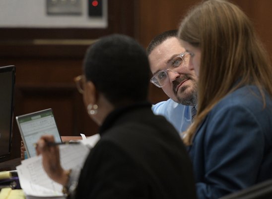 Lee Allen Mayhew, center, talks with public defender Renata Newbill-Jallow, left, and assistant Elise Miller in between interviews with potential jurors on Monday, Jan. 30. Mayhew is accused murdering Bonnie Rushing in 2020.