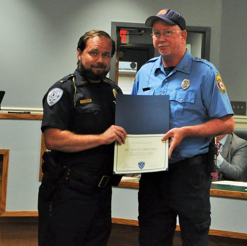 Lt. Daniel Thompson and Scott Brooks