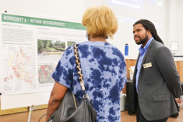 Photo Courtesy City of Statesboro Justin Williams, Planning & Housing Administrator for the City of Statesboro, answers questions from a resident during the 2022 development code public meeting.