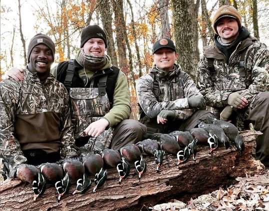 Photo Courtesy Wildlife Resources Division, Georgia DNR A group of Georgia hunters show off their hunt from Thanksgiving in 2022.
