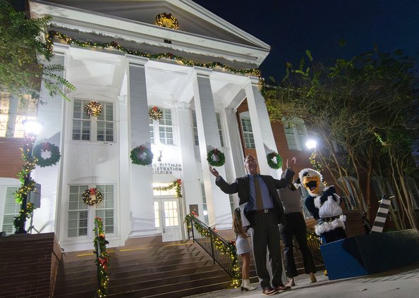 Georgia Southern University President Kyle Marrero presents a lit-up Marvin Pittman administrative building after flipping the ceremonial switch during the official Lighting of Sweetheart Circle at Georgia Southern University on Nov. 16