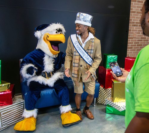 Georgia Southern Homecoming Duke JB Coleman of Thomasville thanks Santa Gus for a picture at the Williams Center following the official Lighting of Sweetheart Circle.