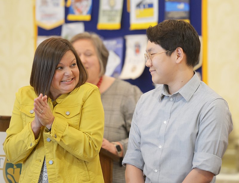 Brooklet Elementary School teacher Joey Harvey reacts as Eric Lim of Southeast Bulloch High School is named the 2023 Bulloch County STAR student during a ceremony hosted by the Rotary Club of Statesboro at the Forest Heights Country Club in February.