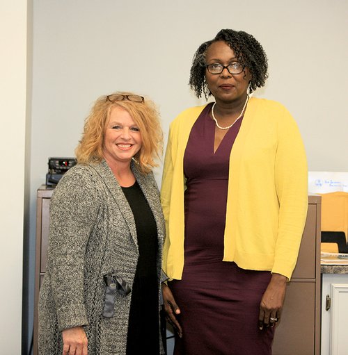L to r:  Associate Probate Judge Tara Finnerty administering oath of office to new City of Collins Council member Tracy Buford.