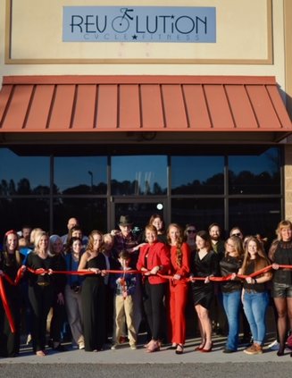 Revolution Cycle ribbon cutting