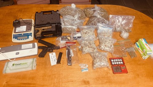 Drugs and weapons seized