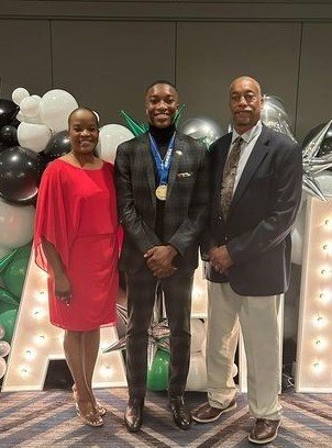Nathan Hayes with parents at State 4-H